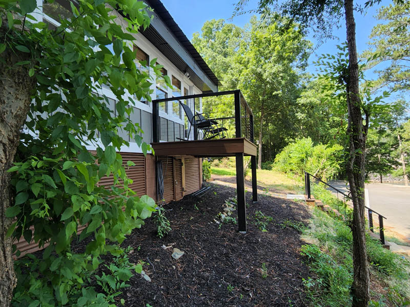 Home exterior project with porch and ivy